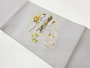 金糸色紙に楽器・扇・桜模様刺繍開き名古屋帯（額縁仕立て）